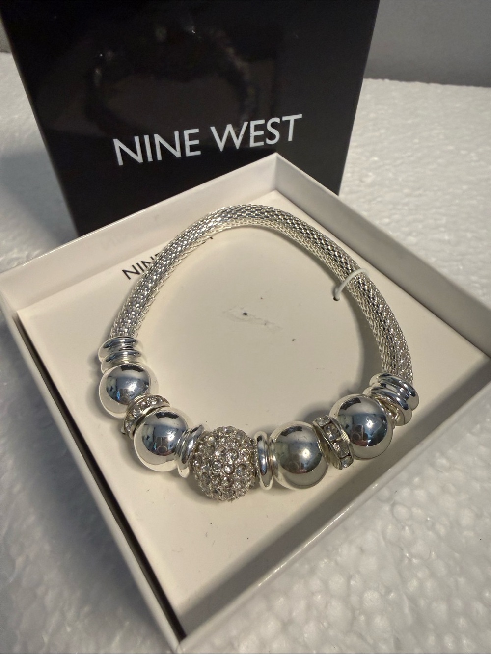 Nine West Silver-Tone Mesh
Stretch Bracelet with Crystal
Accent Beads New In box